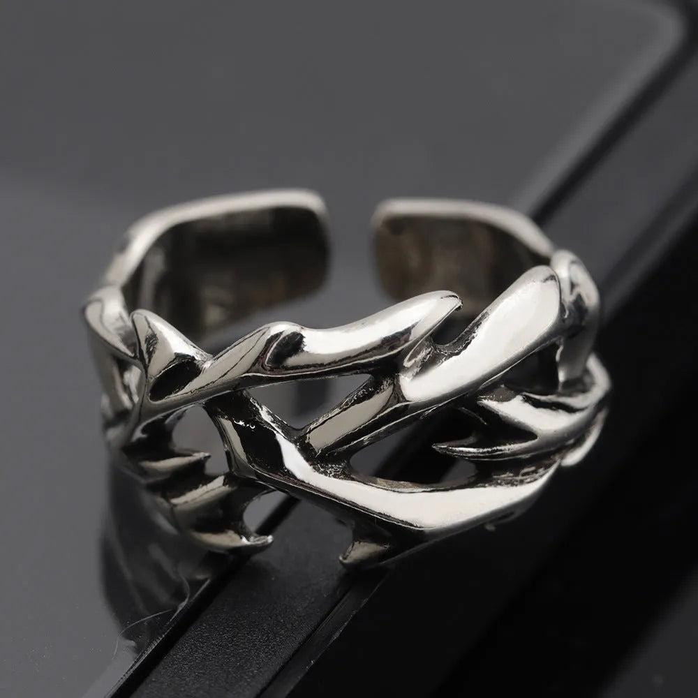 Copper geometric thorn flower ring with adjustable opening in colour J2150 thorns