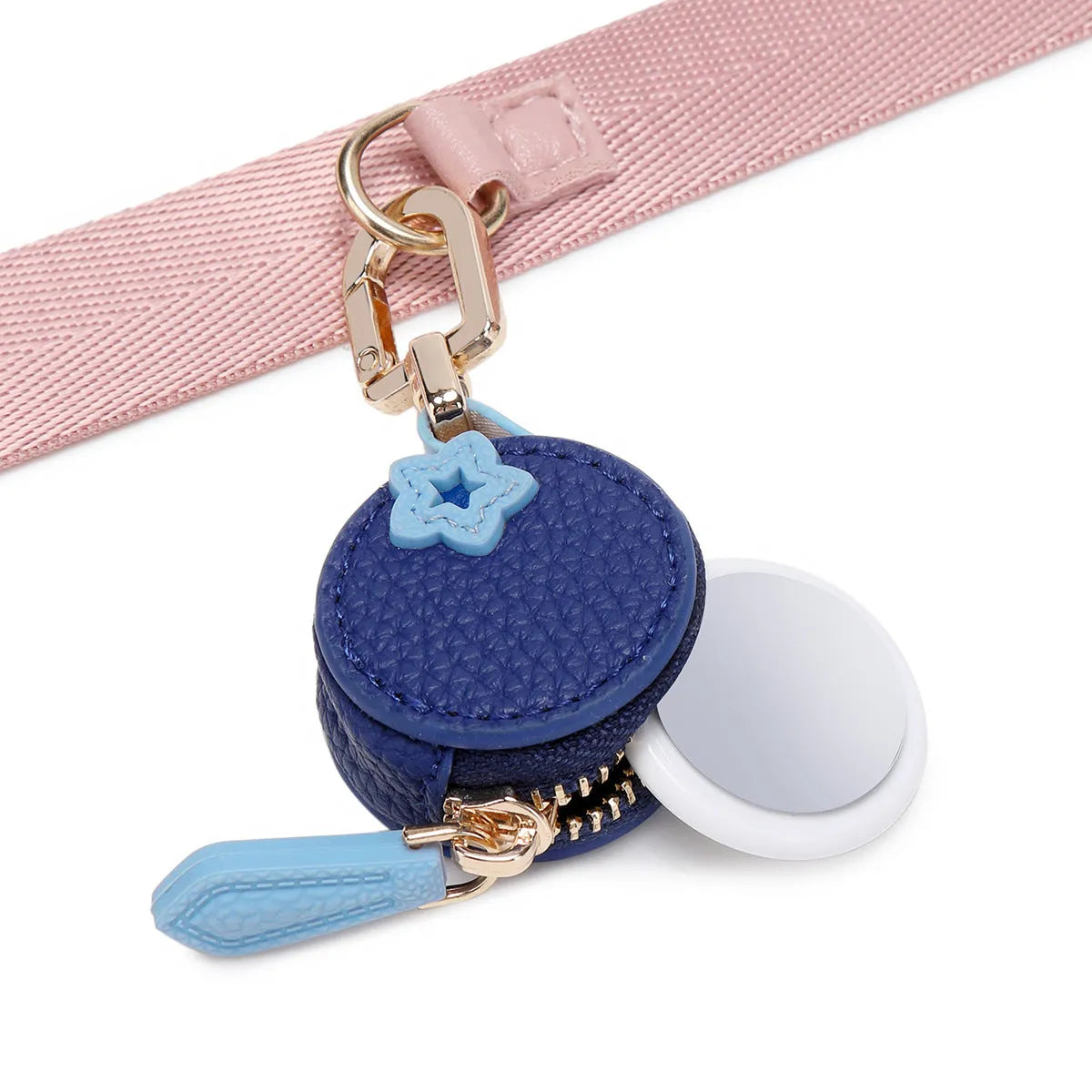 Solid colour leather keychain with small attached coin pouch in cherry red, blueberry blue, or orange.