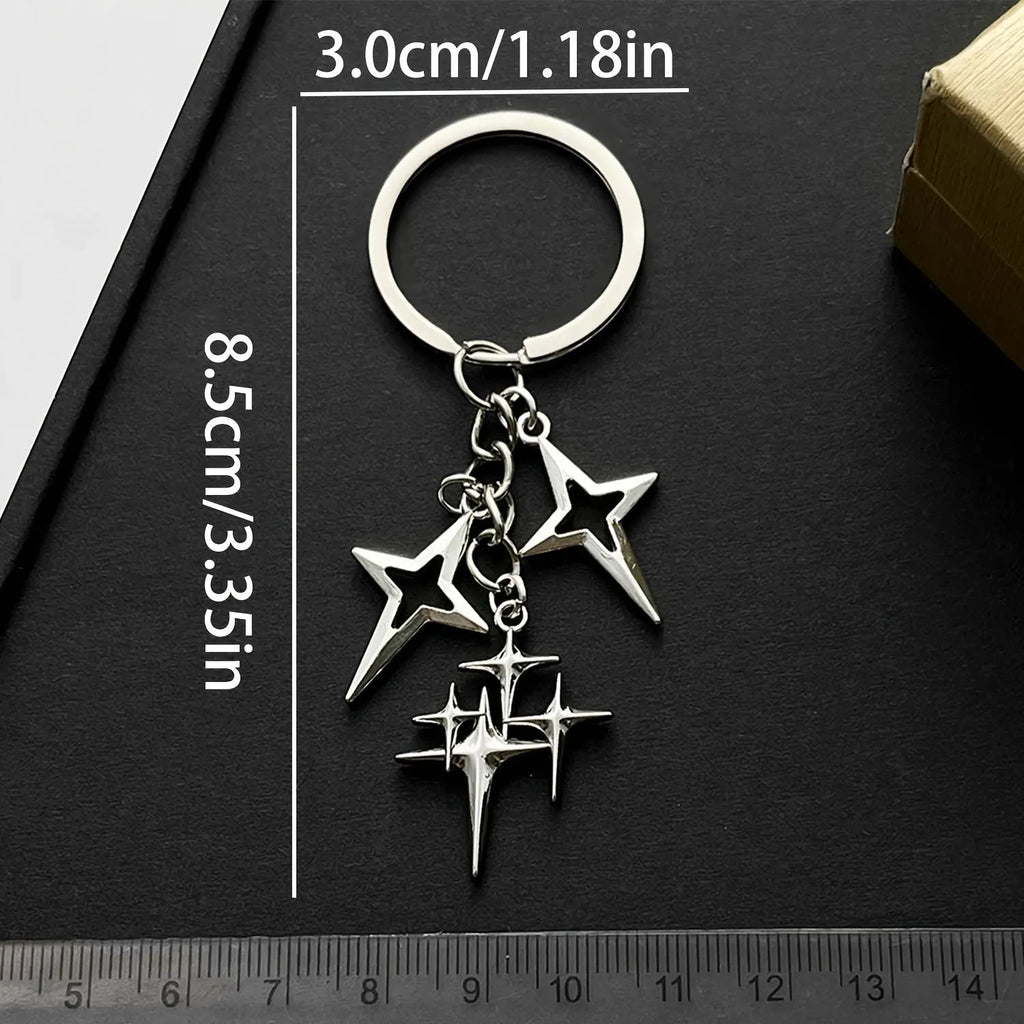 Retro metal alloy keychain with four eight-pointed stars in Q53 colour
