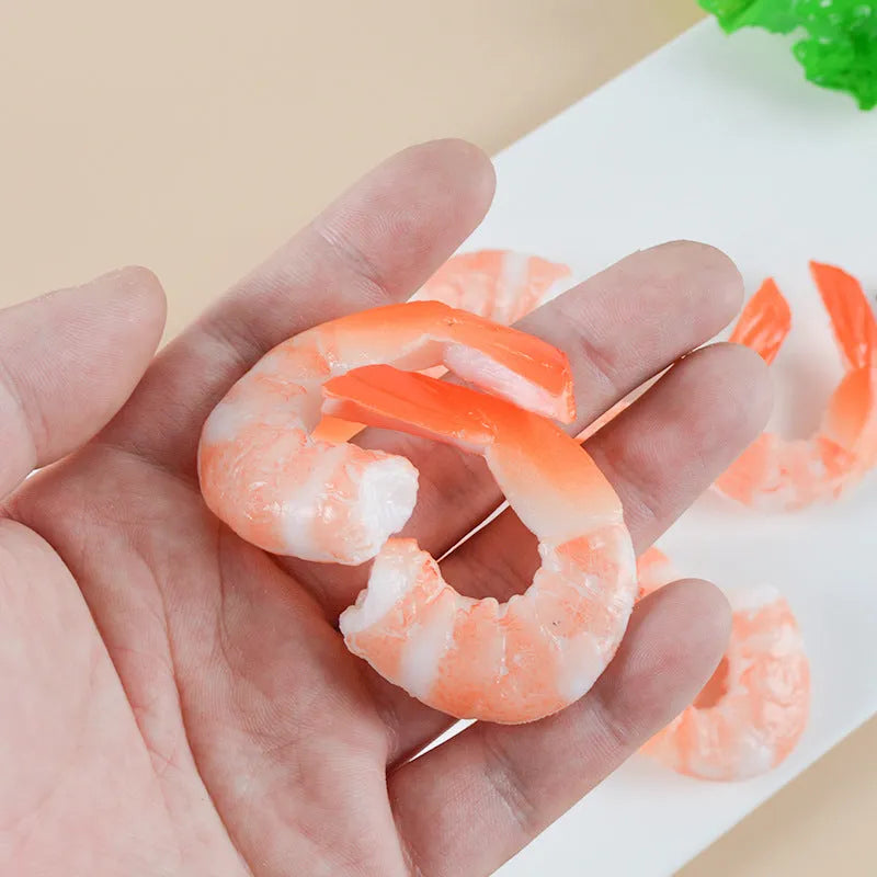 PVC simulation shrimp-shaped novelty keychain with door buckle, shown in modern simplicity style.
