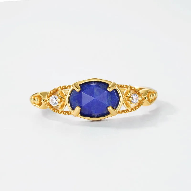 Japanese style silver lapis lazuli ring with elliptical geometric design and round stone centre