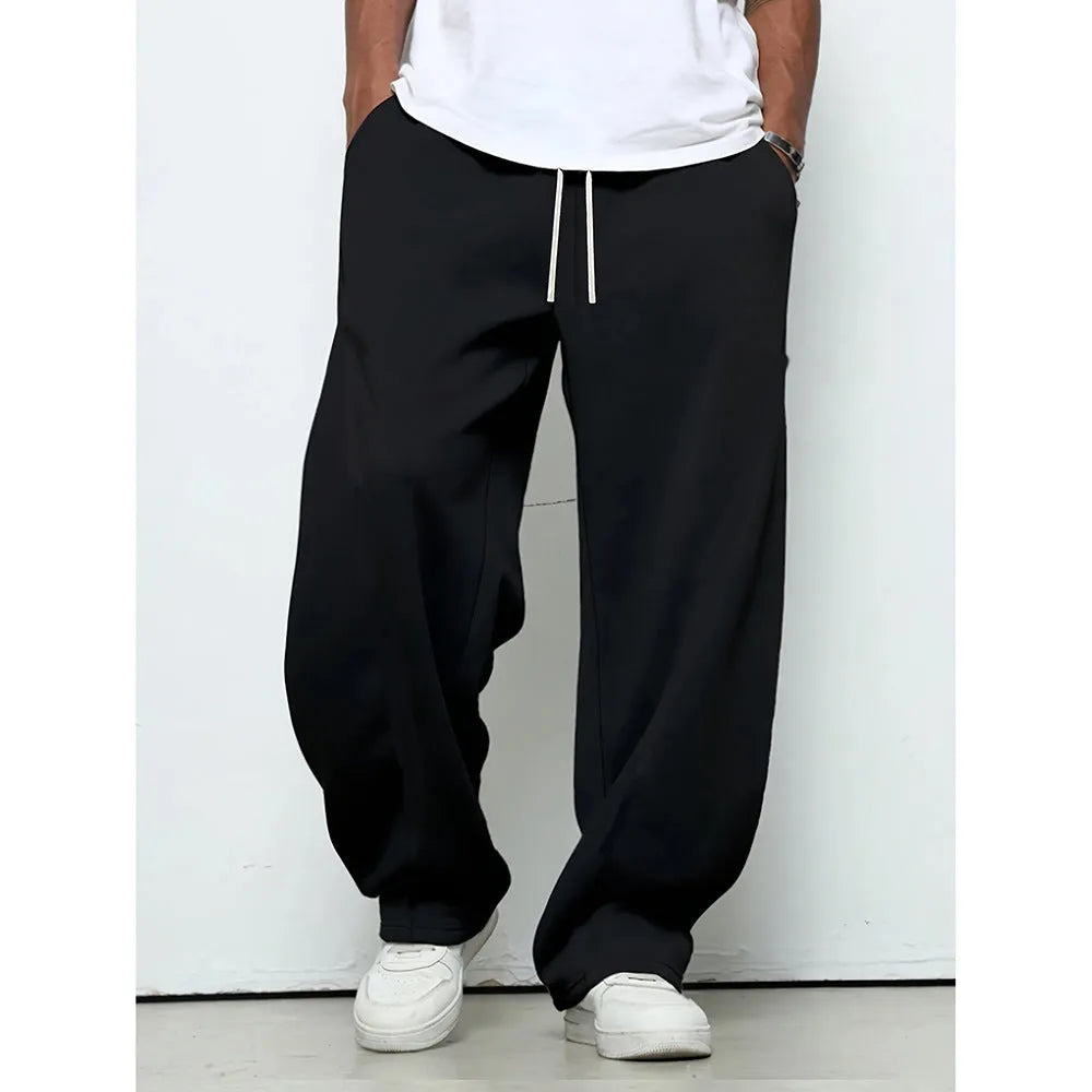 Men's straight-leg casual trousers in black with a drawstring waistband