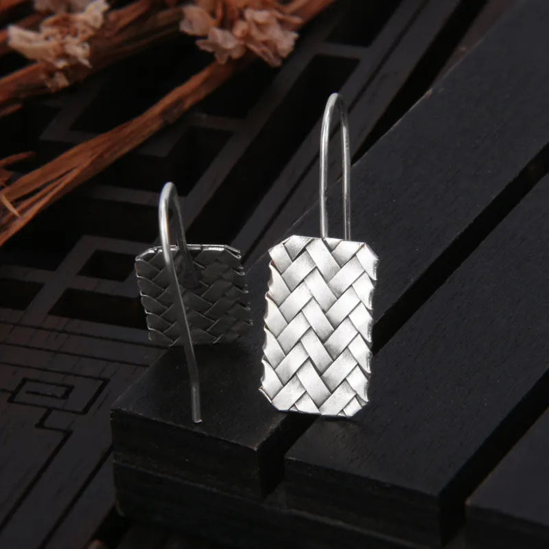 Silver geometric earrings with woven diamond plaid pattern, 17.5mm x 11mm dimensions