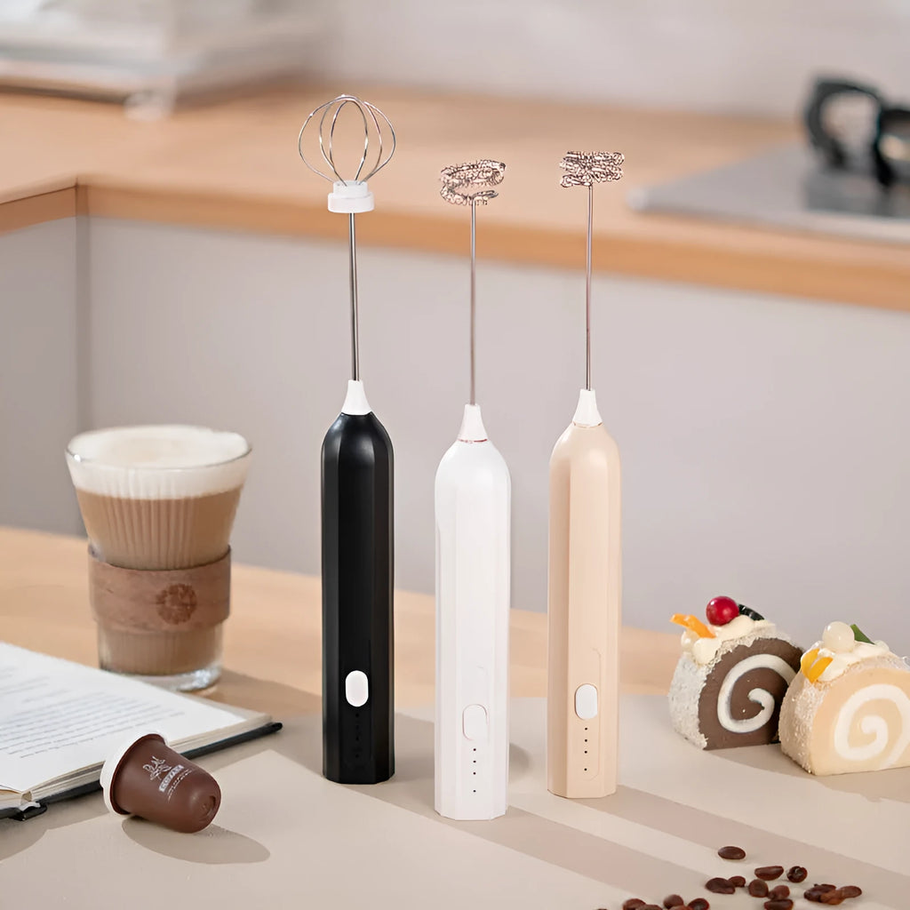 USB rechargeable handheld electric whisk in white with three speed settings and egg beater attachment