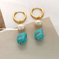A pair of geometric copper ear clips with irregular turquoise stone and cultured pearls, showing both short and dangle styles.