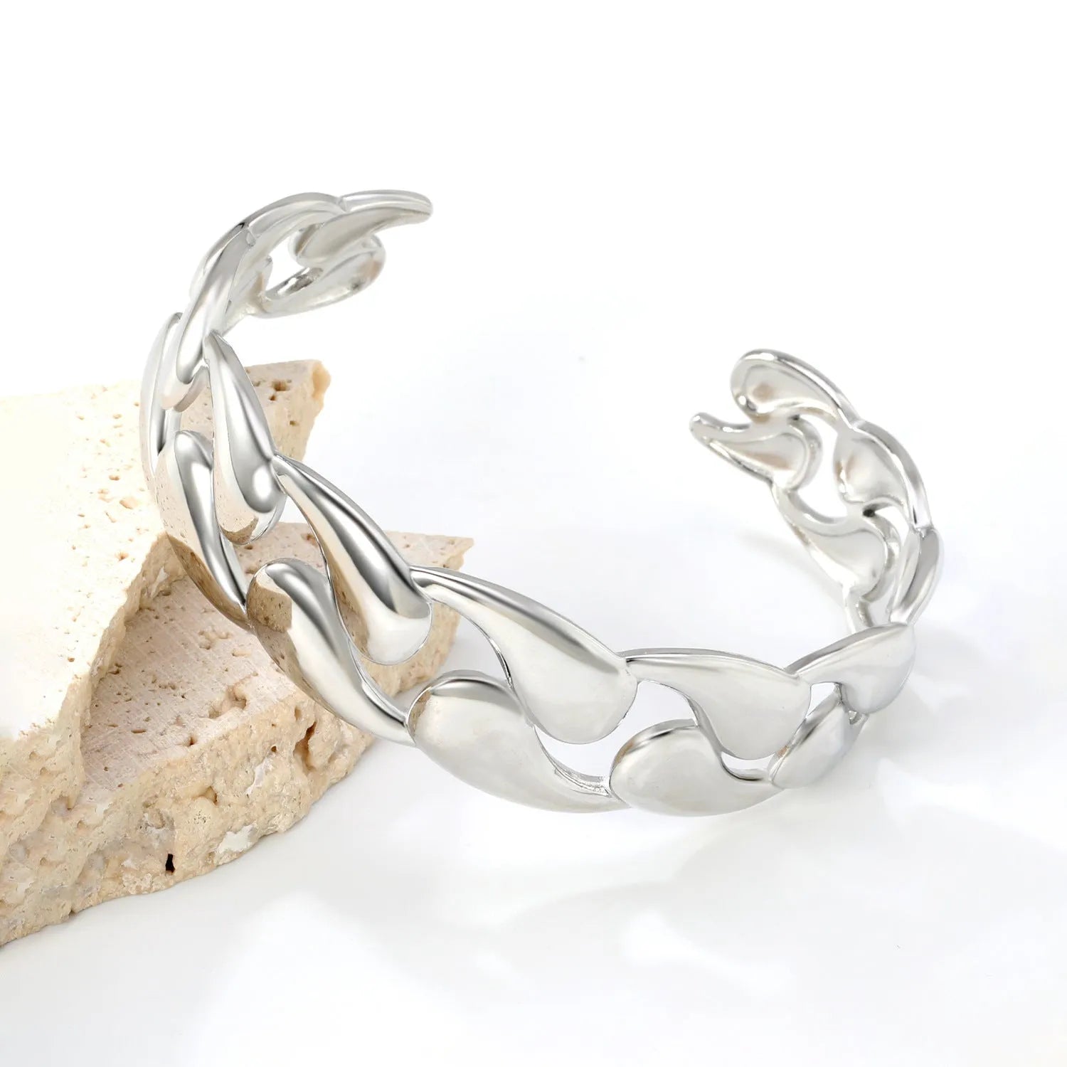 Stainless steel alloy bracelet in gold or silver tone for European American trend styling.