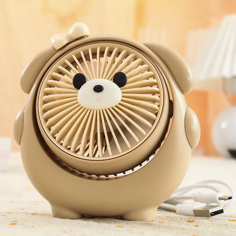 Cute dog-themed USB desktop electric fan showing three-speed controls and plastic construction