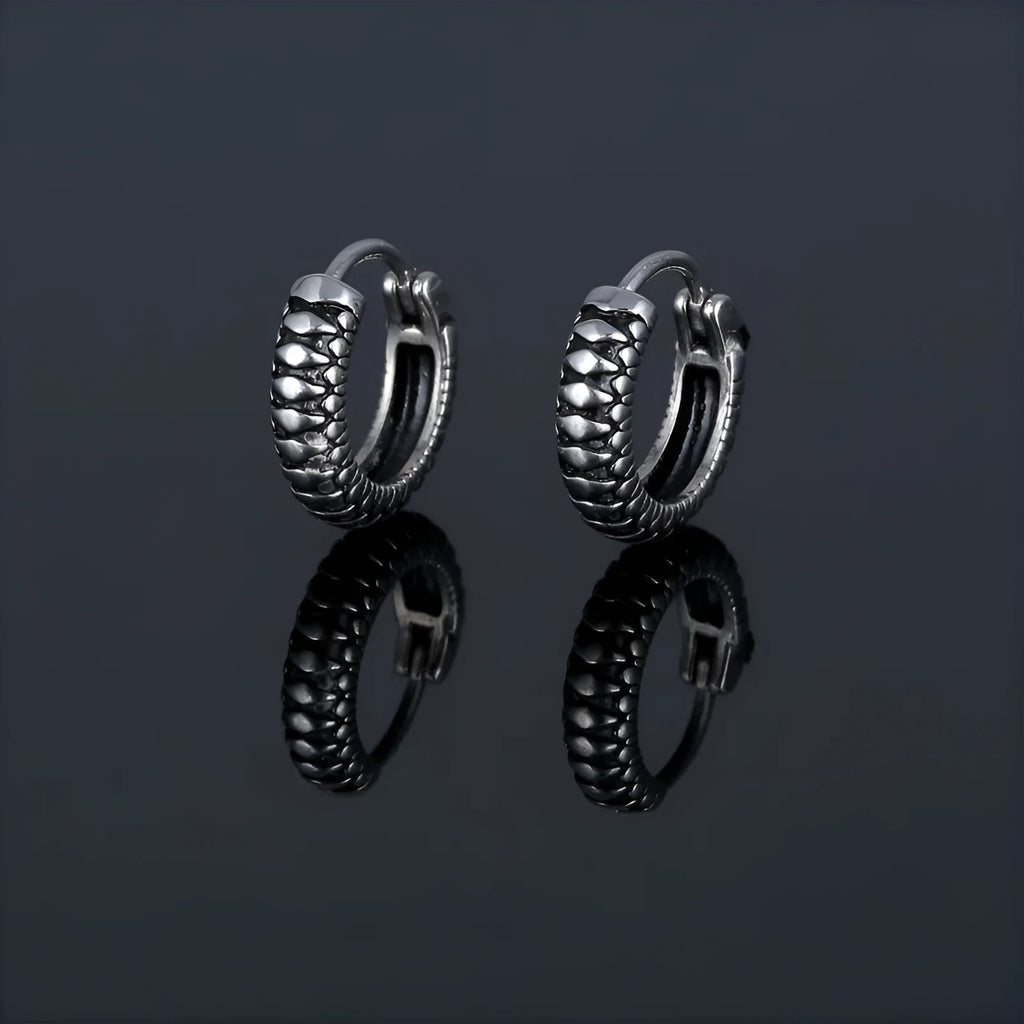 Silver stainless steel retro twist earrings with geometric striped pattern and round elements