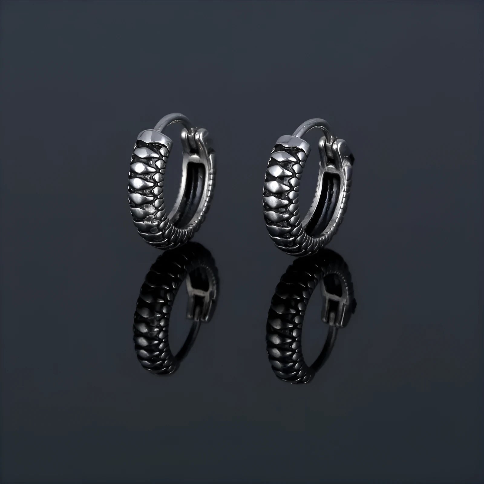 Silver stainless steel retro twist earrings with geometric striped pattern and round elements