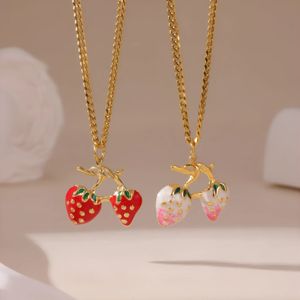 Stainless steel strawberry pendant necklace on an alloy chain, shown in red and white gradient colour options.
