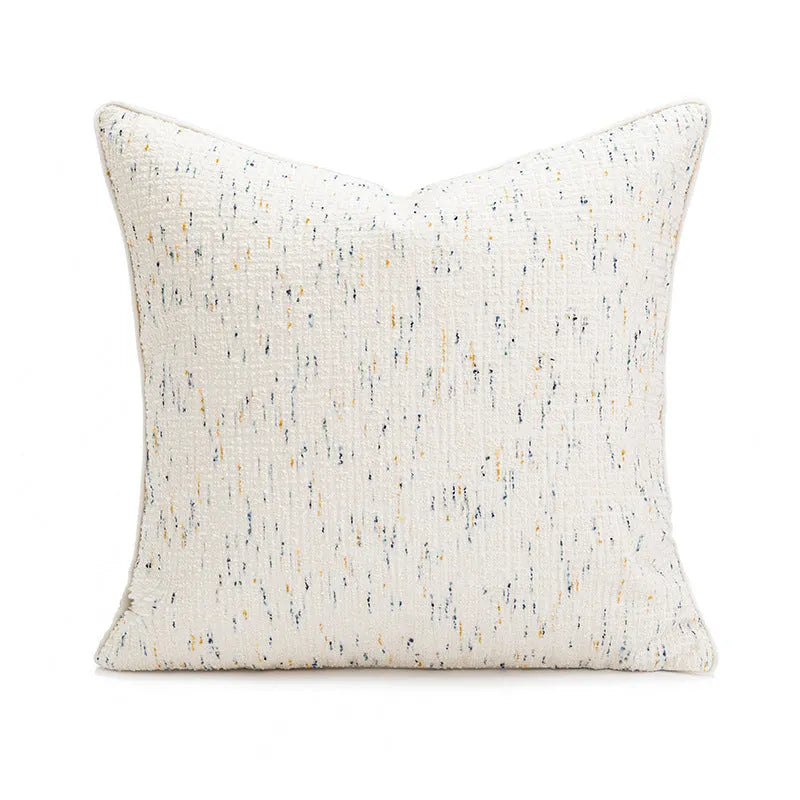Red coffee brown square cushion with PP cotton filler on a grey sofa.