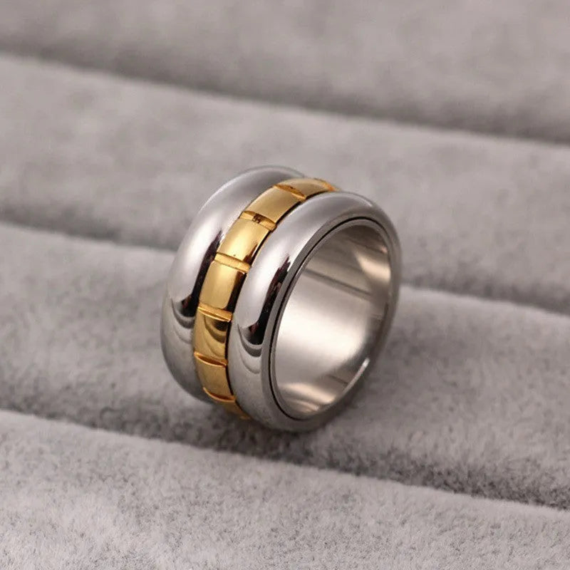 Gold titanium steel knuckle ring with ultra-wide rotatable band design