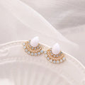 Women's silver retro fan-shaped earrings with an opal-like stone and rhinestone detailing on a geometric alloy setting.