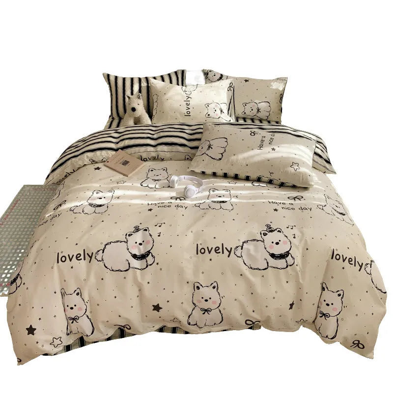 Cartoon dog pattern pure cotton four-piece bedding set shown on a bed, includes multiple size options.