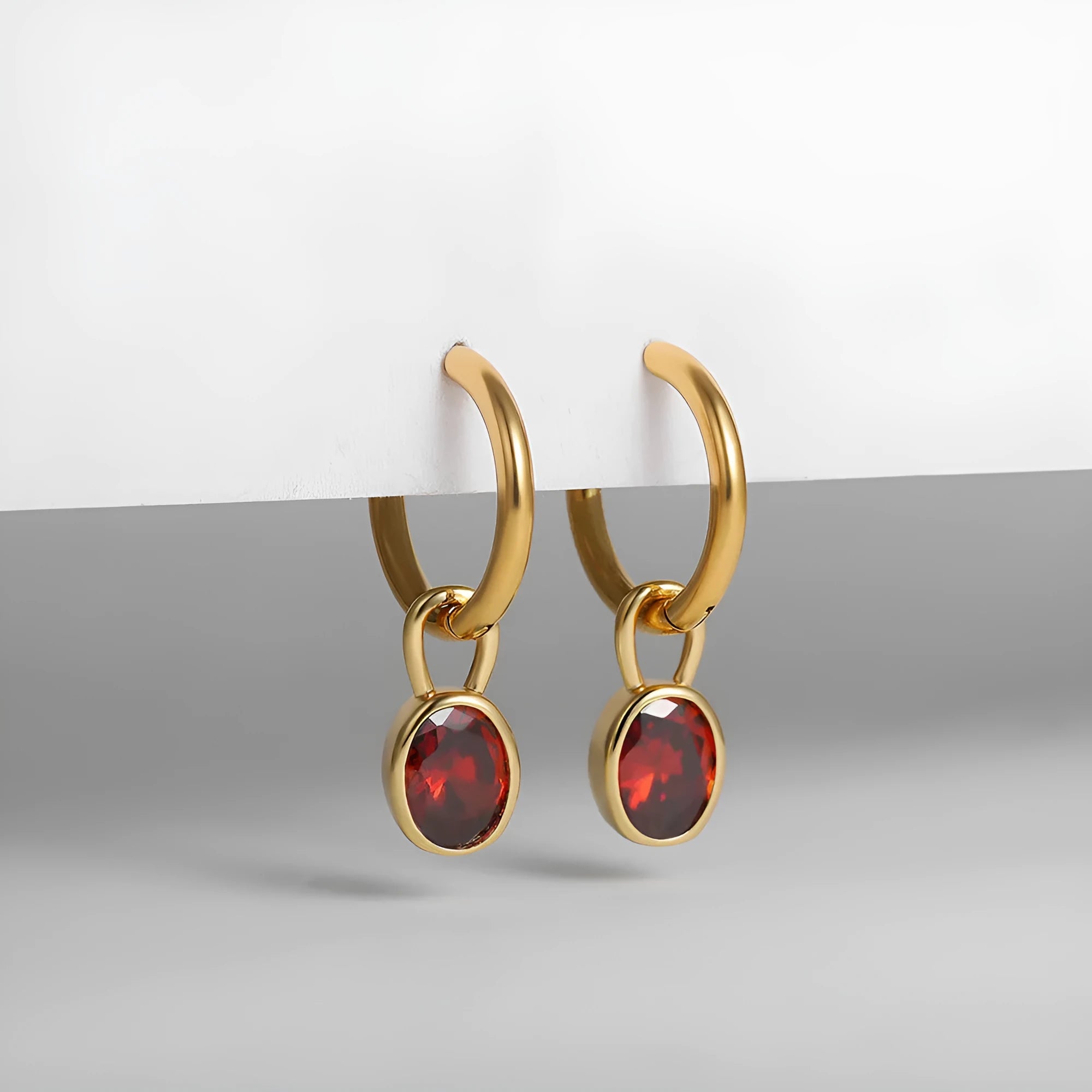 Close-up of women's retro simple oval zircon earrings in copper, showing the six available colour options.