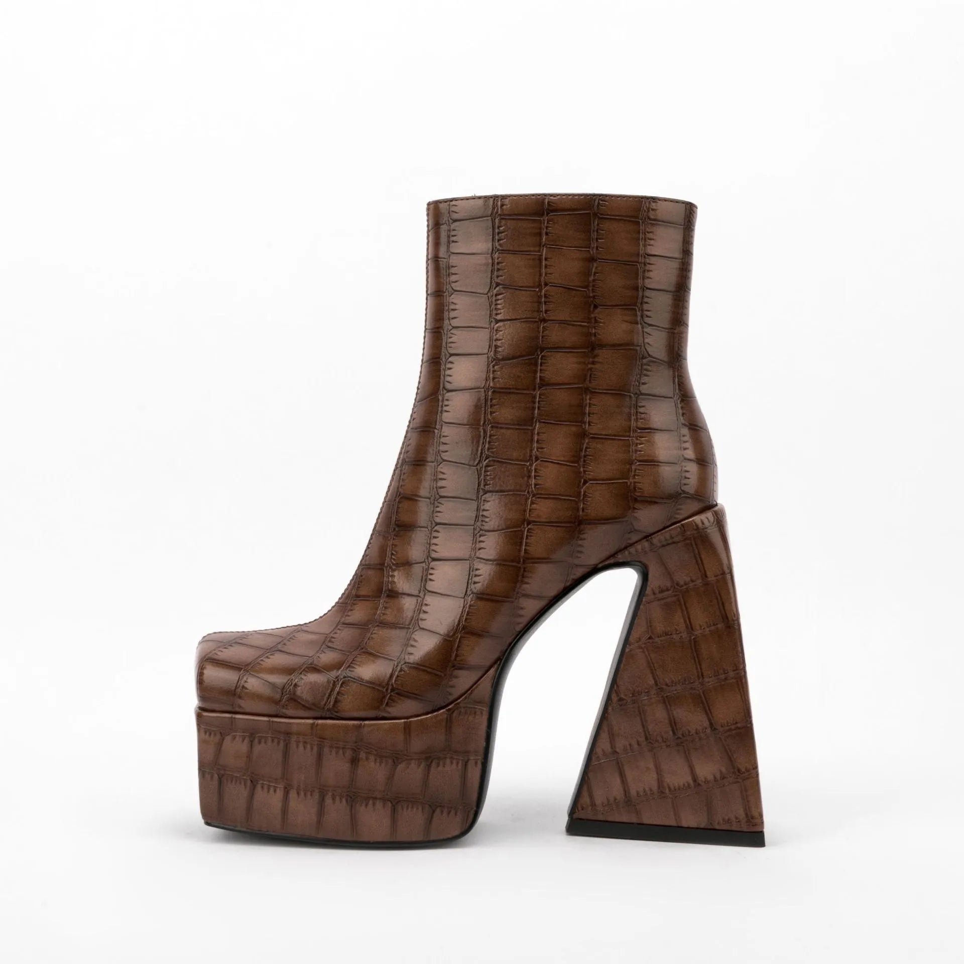 Women's ankle boots with a high heel in artificial PU leather, shown in beige colour.