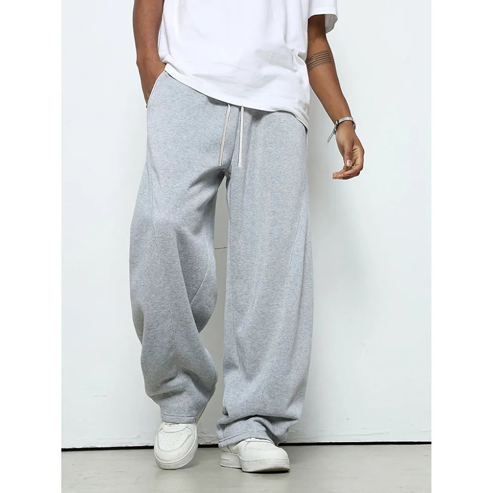 Men's straight-leg casual trousers in black with a drawstring waistband