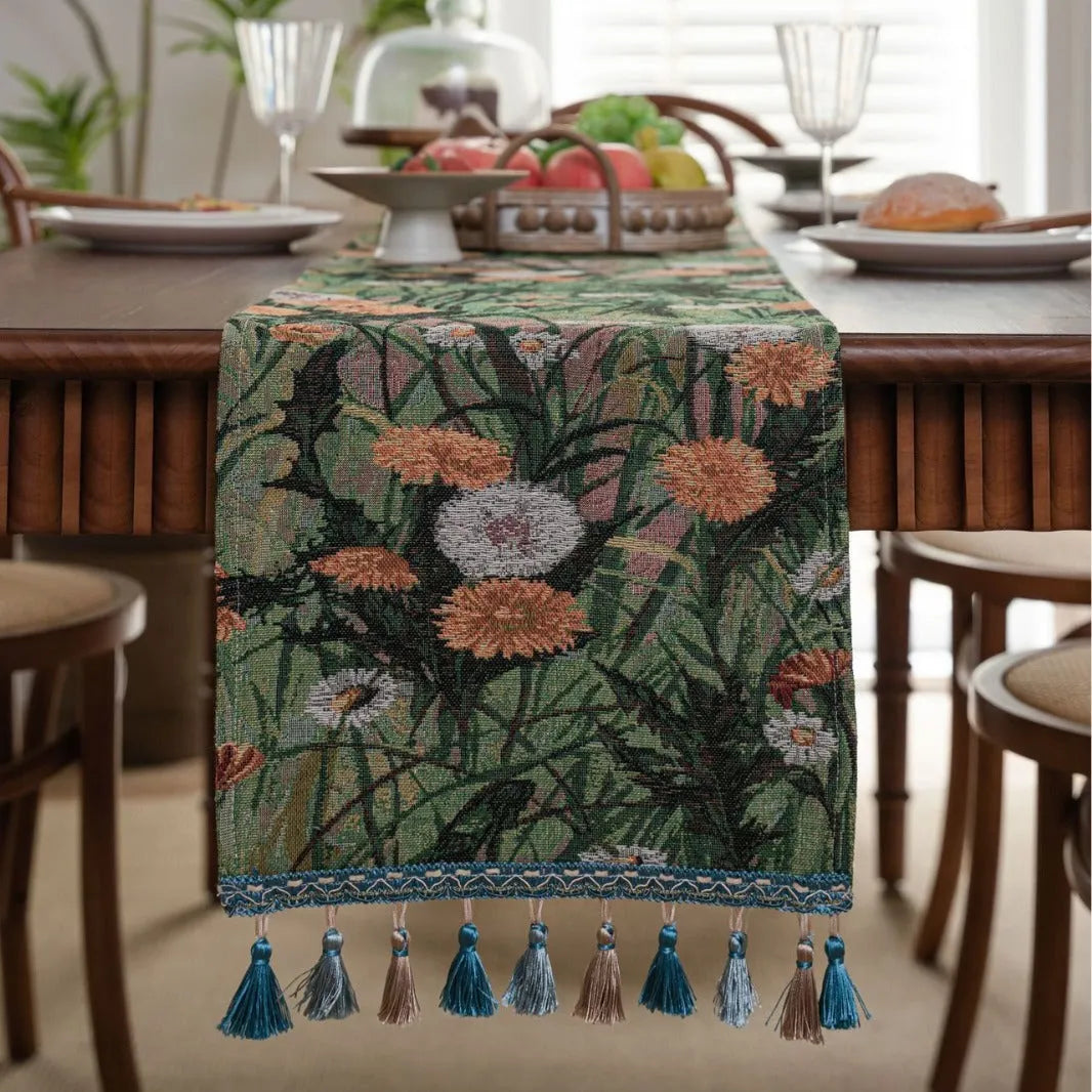 American-style beige jacquard table runner with long tassels and floral pattern on a dining table.