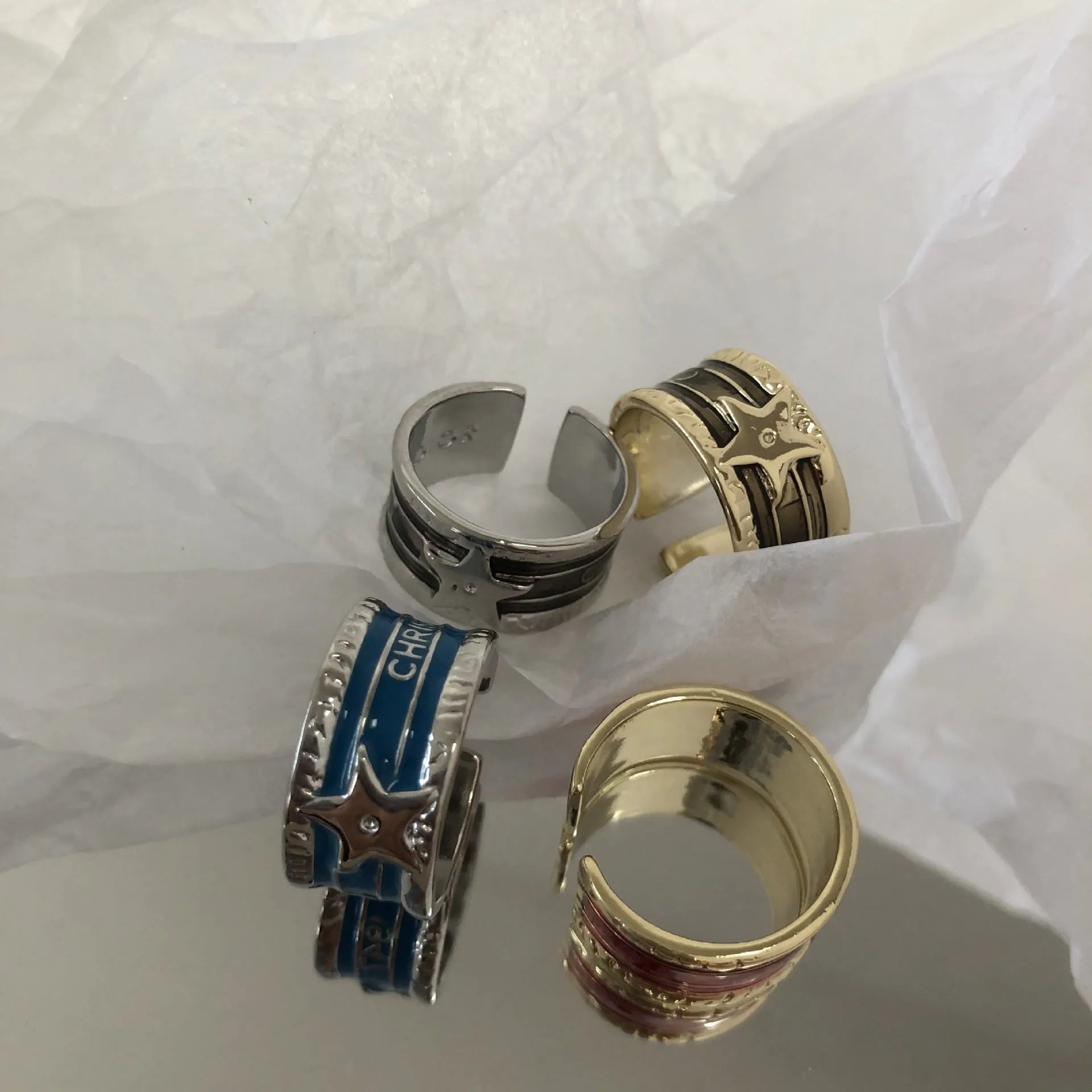 XINGX geometric oil drop ring with adjustable band and distressed finish in multiple colours.