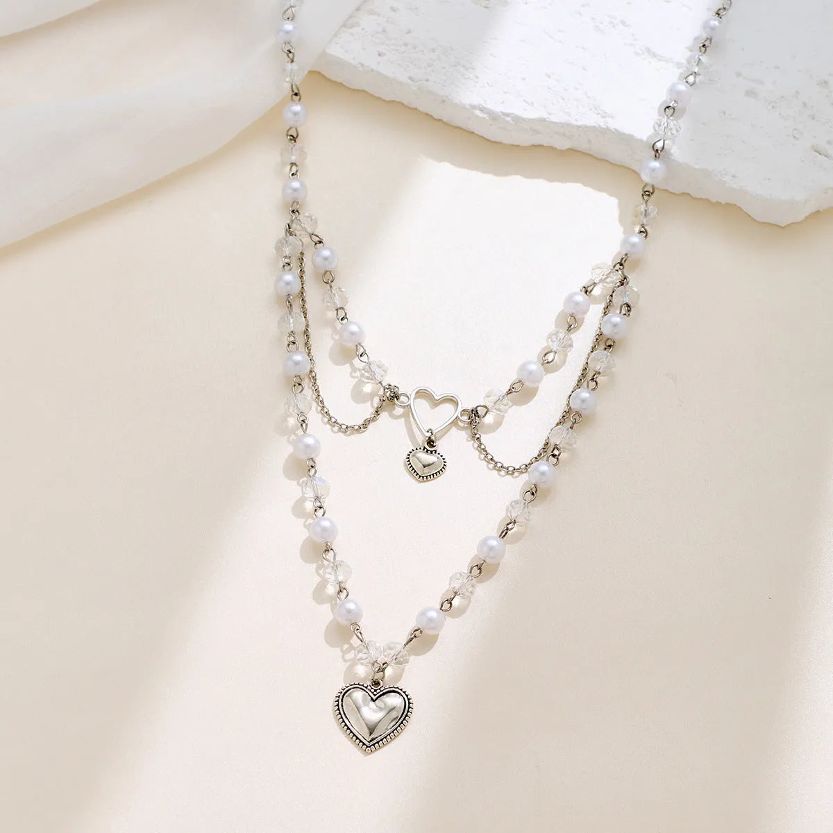 Retro alloy double-layer love heart necklace with electroplated finish