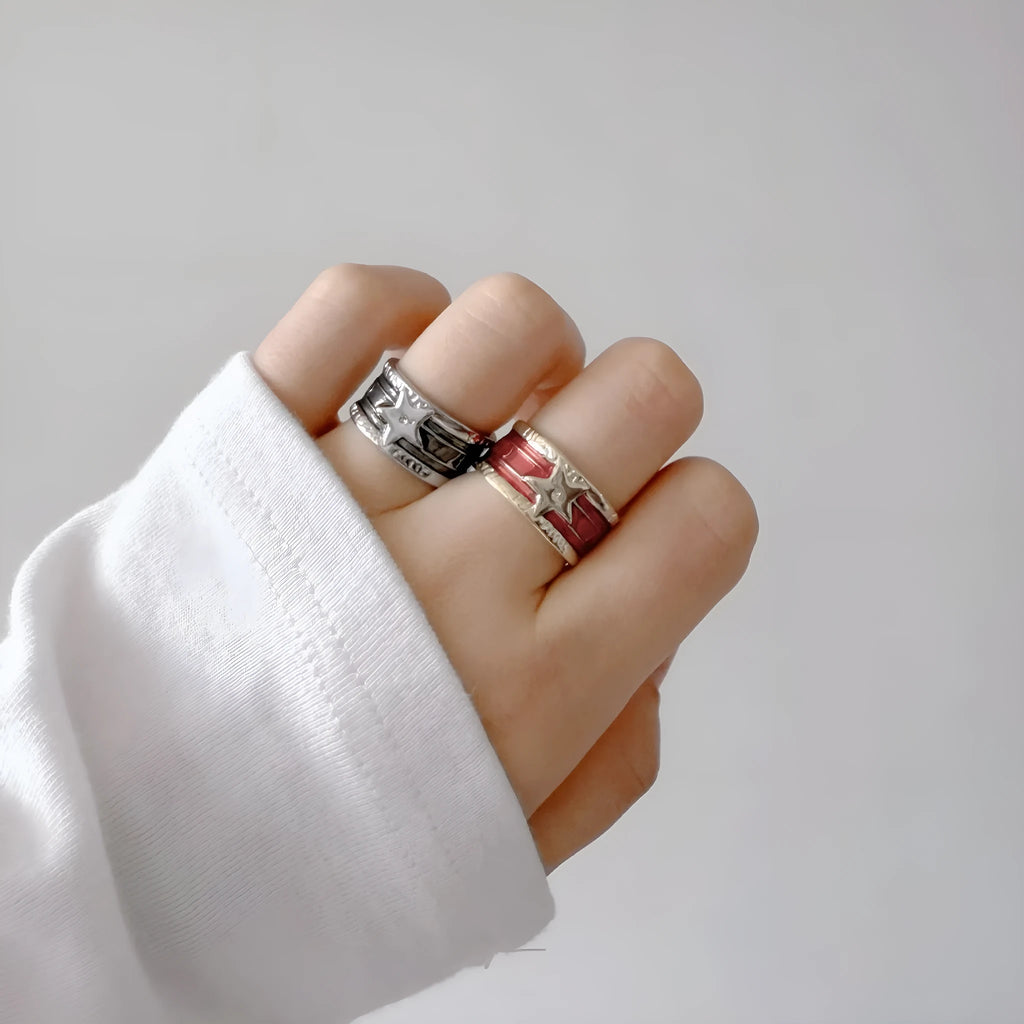 XINGX geometric oil drop ring with adjustable band and distressed finish in multiple colours.