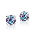 A pair of geometric 925 silver ear studs featuring a cultivated Alexandrite stone.