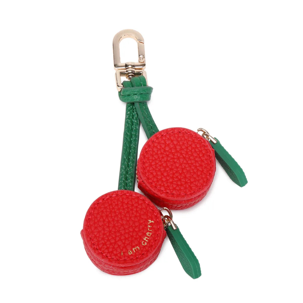 Solid colour leather keychain with small attached coin pouch in cherry red, blueberry blue, or orange.