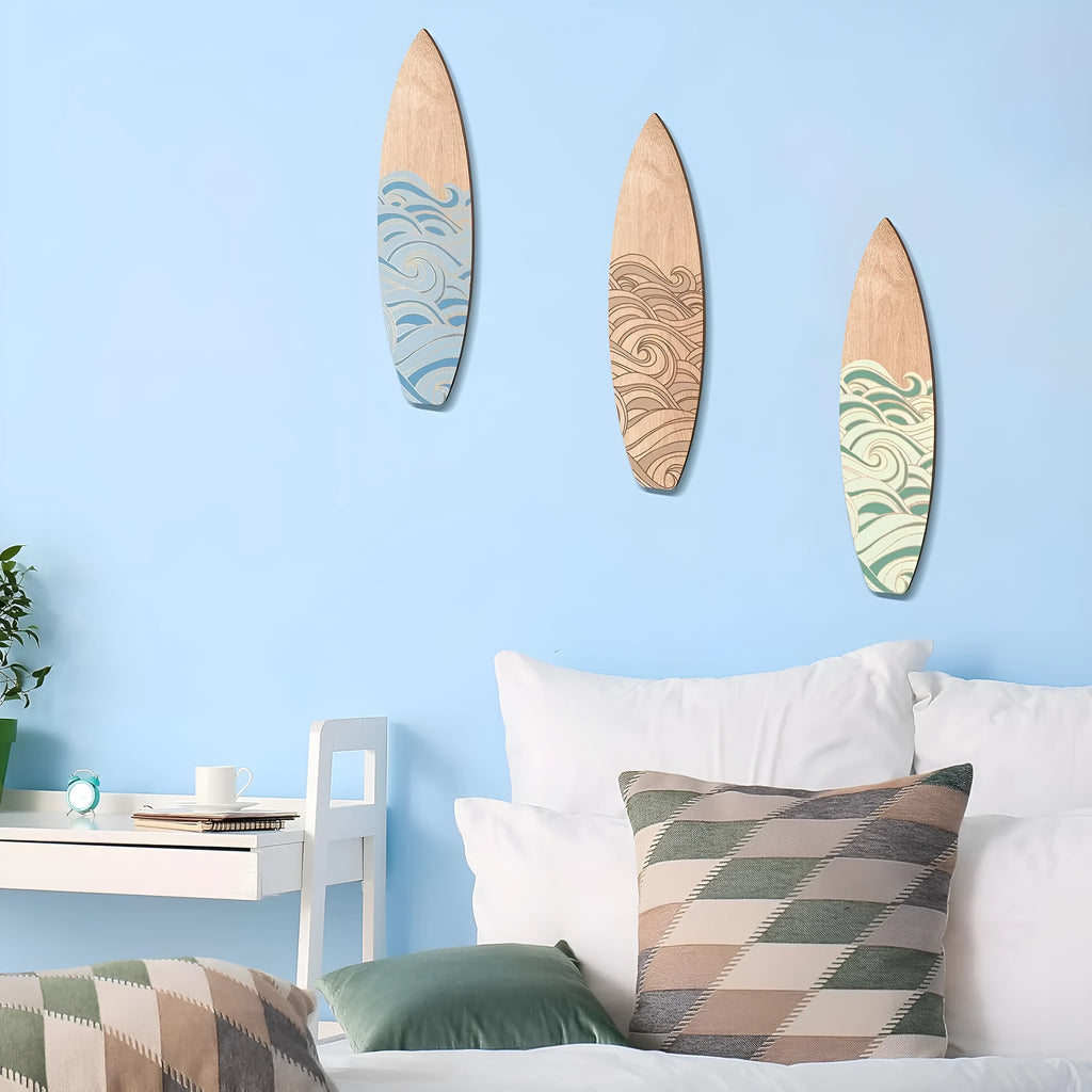 Three wooden surfboard wall decorations with boxwood construction displayed together