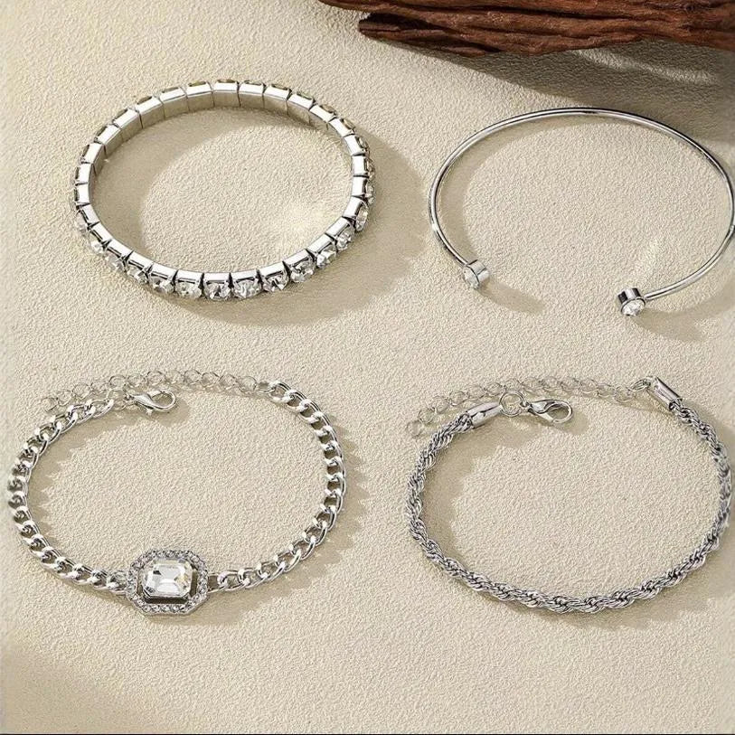Retro geometric alloy four-piece jewellery set showing bracelet, earrings, necklace and ring with square diamond chain designs