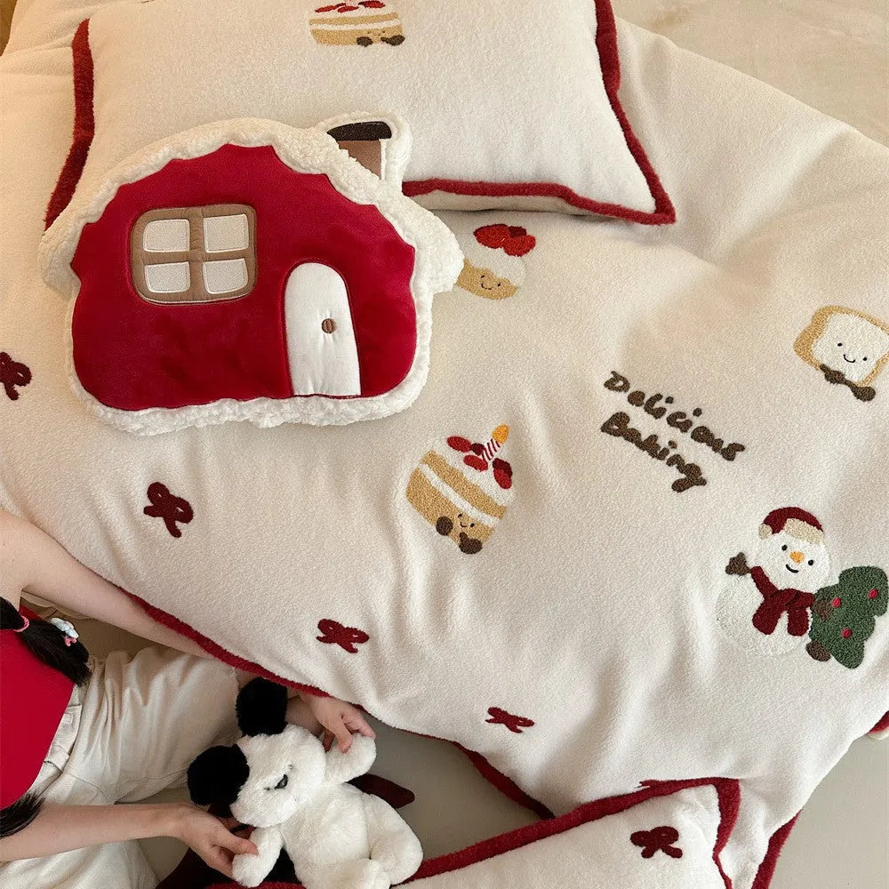 Winter Christmas cartoon cashmere bedding four-piece set shown on bed with duvet cover and pillowcases