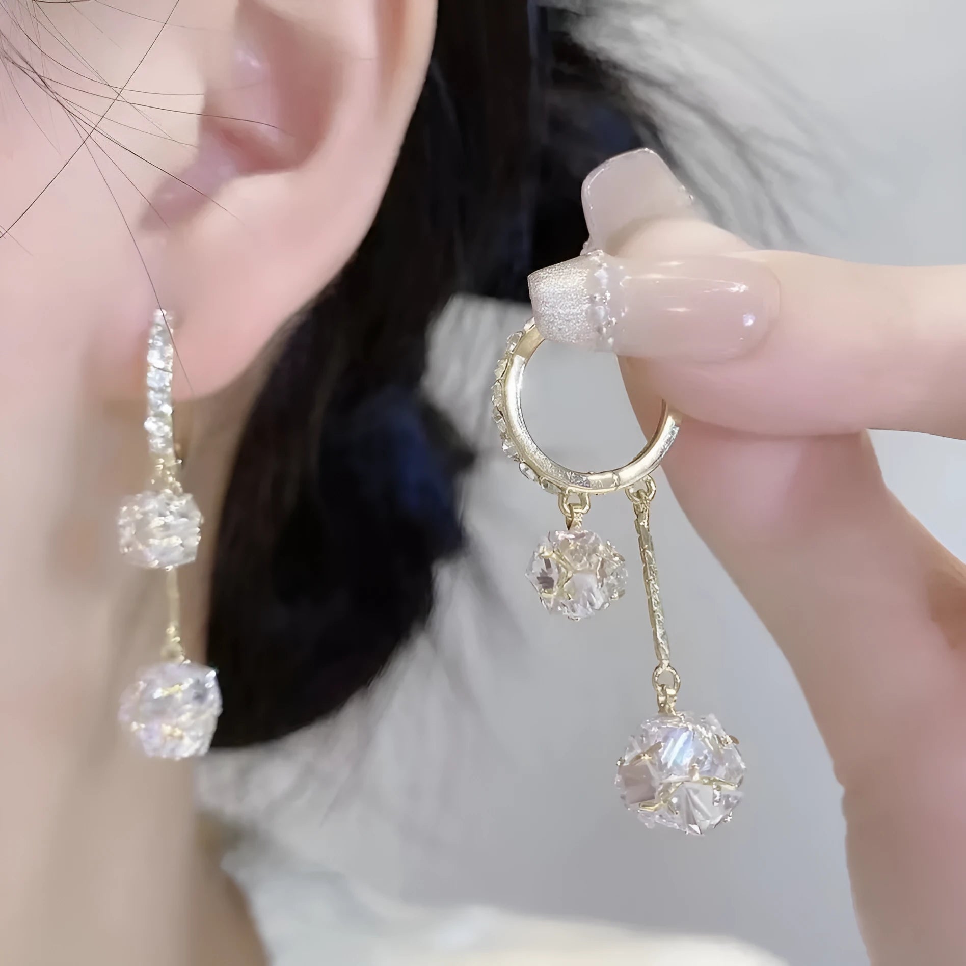 Silver tassel ball earrings with rhinestone drops and confession balloon motifs on copper base