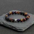 Handmade natural tiger-eye stone bracelet with geometric beads on elastic band