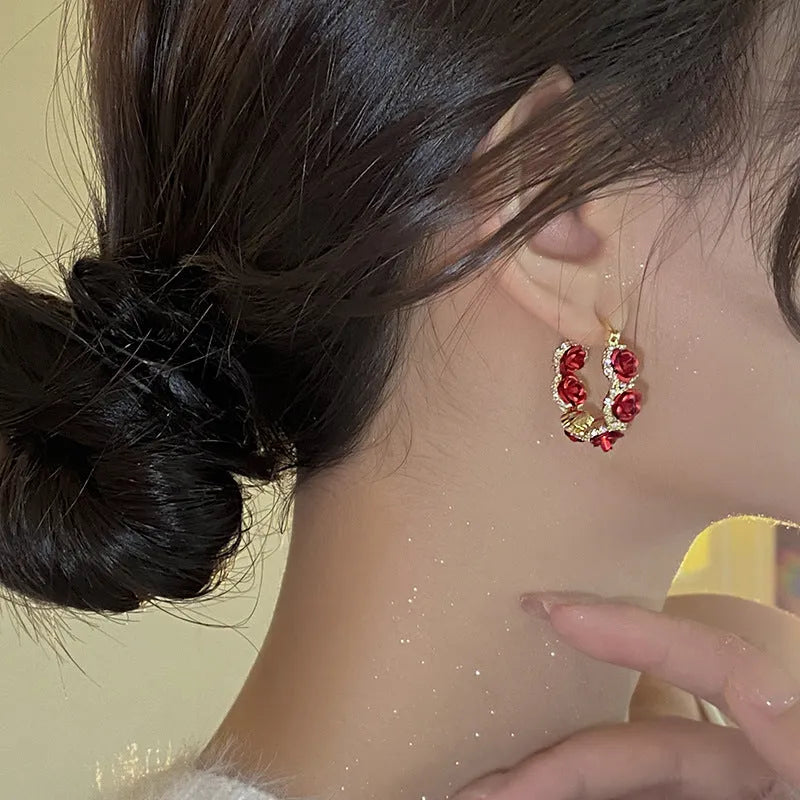 Red alloy flower clip earrings with rose design for women