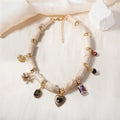 Green bamboo leaf heart-shaped resin pendant necklace with gold tone electroplated chain