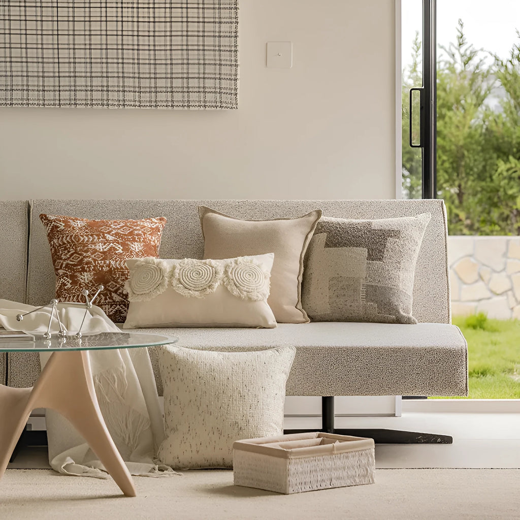 Red coffee brown square cushion with PP cotton filler on a grey sofa.