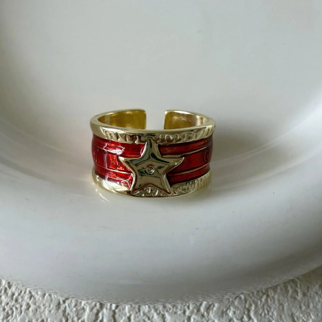 XINGX geometric oil drop ring with adjustable band and distressed finish in multiple colours.
