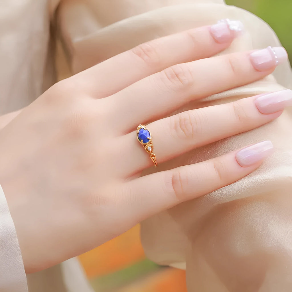 Japanese style silver lapis lazuli ring with elliptical geometric design and round stone centre