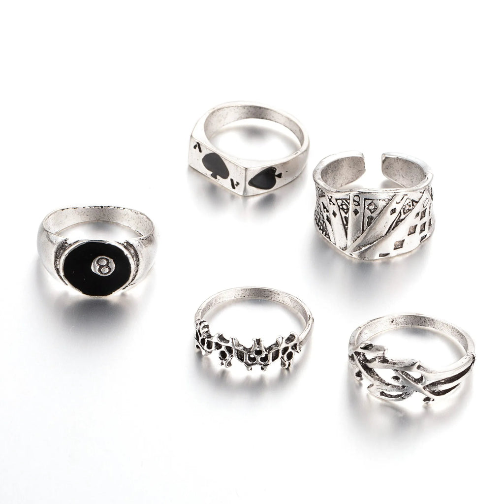 Black alloy poker ring with retro spade card design showing adjustable sizing feature