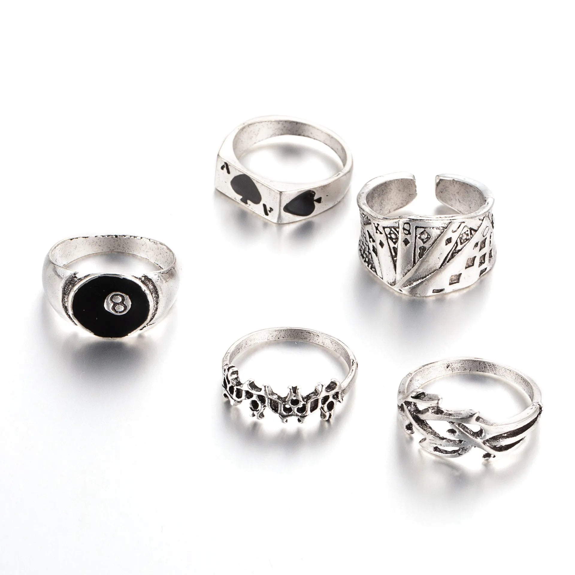 Black alloy poker ring with retro spade card design showing adjustable sizing feature