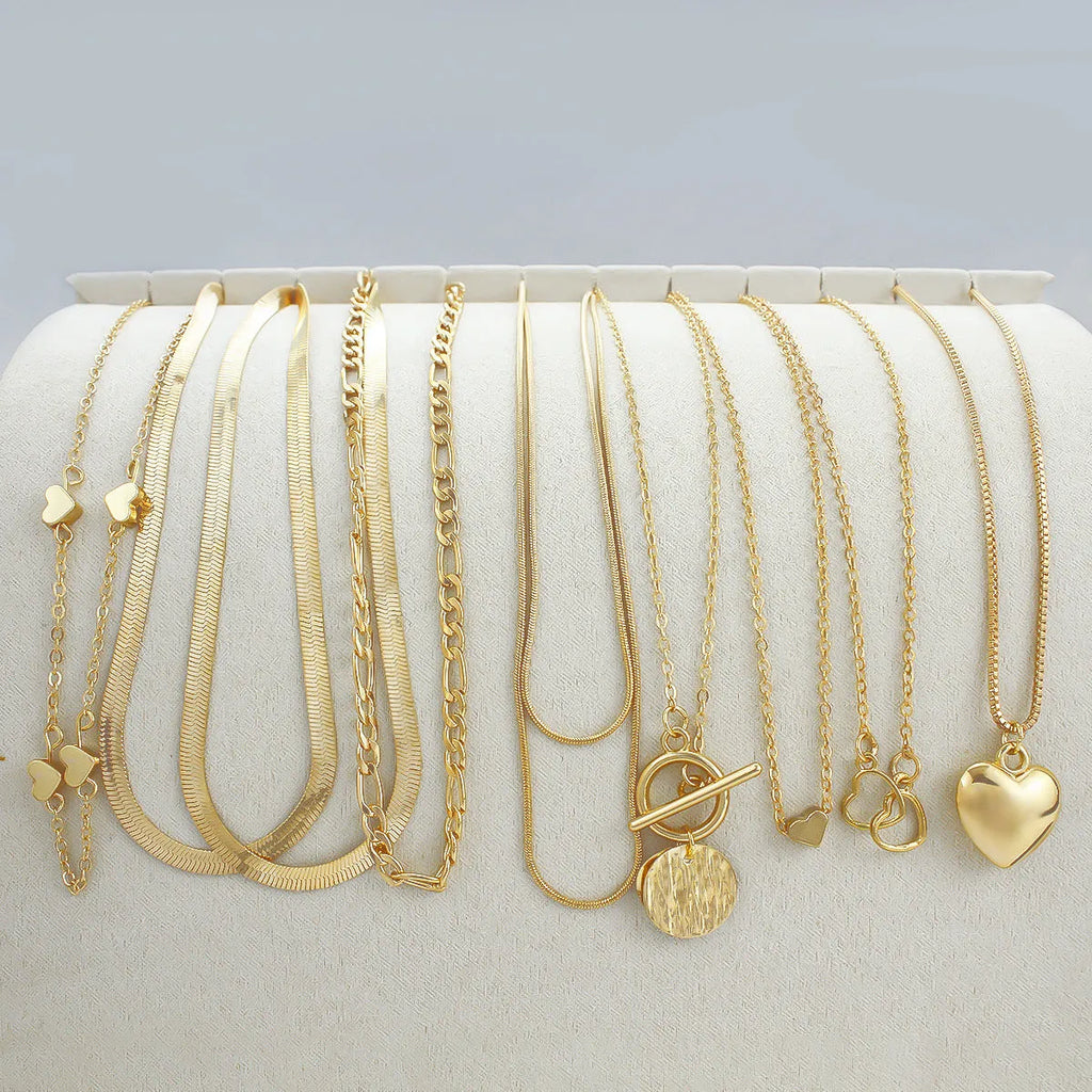 Gold electroplated women's necklace set with 10 pieces and adjustable snake bones chain