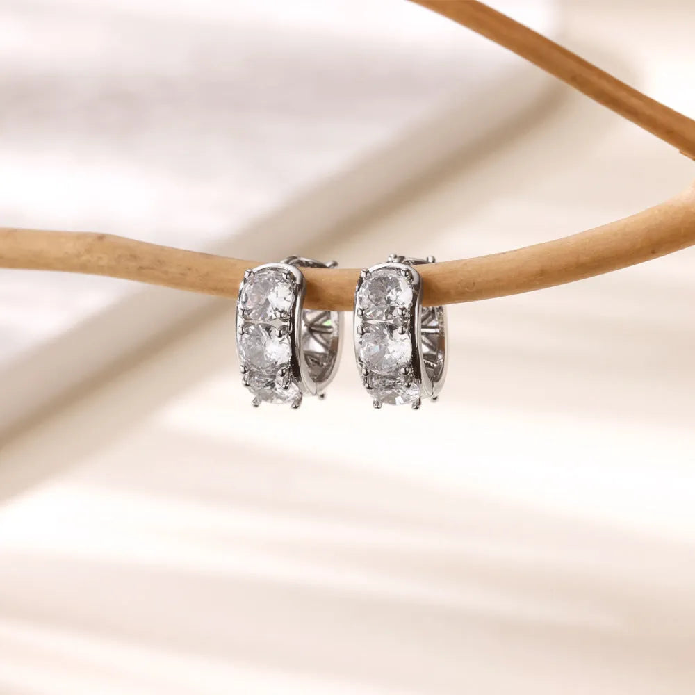 Stainless steel U-shaped clip earrings for women with inlaid zircon details in colour E5772P.