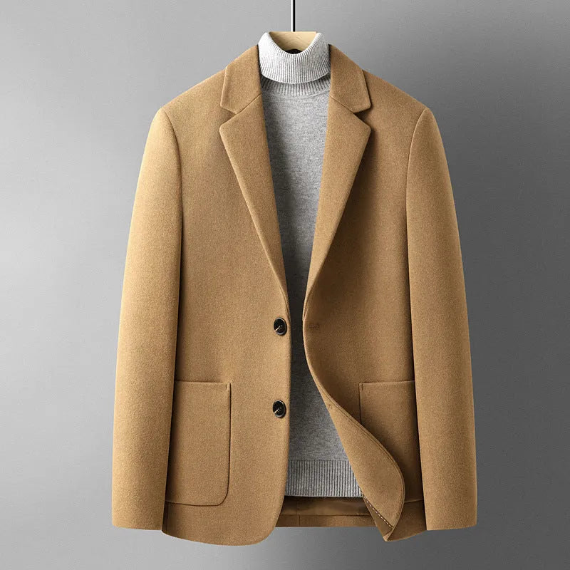 A grey slim-fit men's wool suit blazer with a non-ironing finish for autumn wear.
