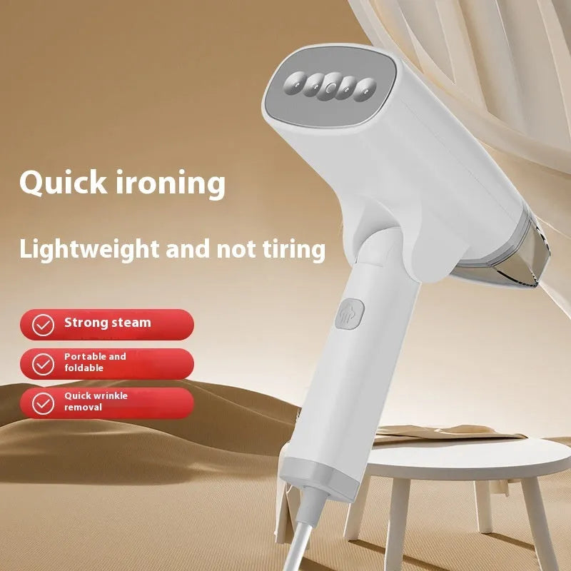 Blue handheld garment steamer with water tank and temperature control dial