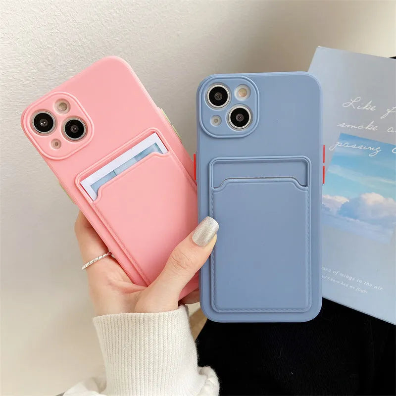 Sky blue colour block silicone iPhone case with a built-in card slot on the back.