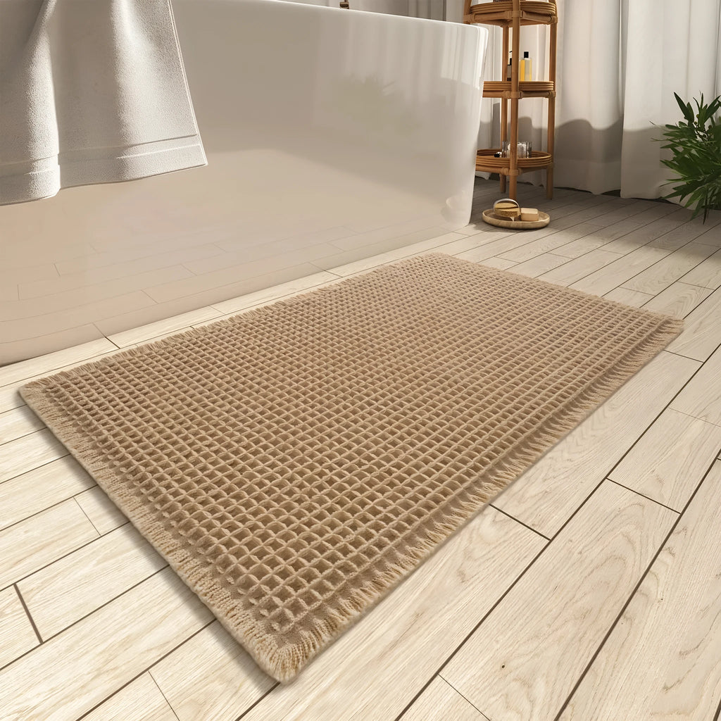 Checkered pattern non-slip absorbent bathroom floor carpet in beige colour.