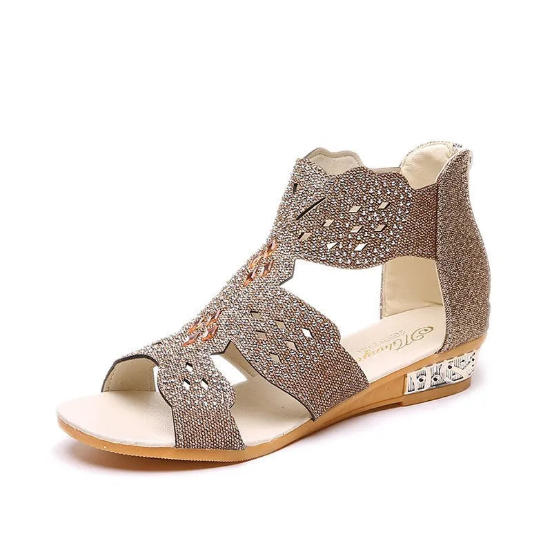 Women's beige open toe sandals with rhinestone detail and a back zipper.