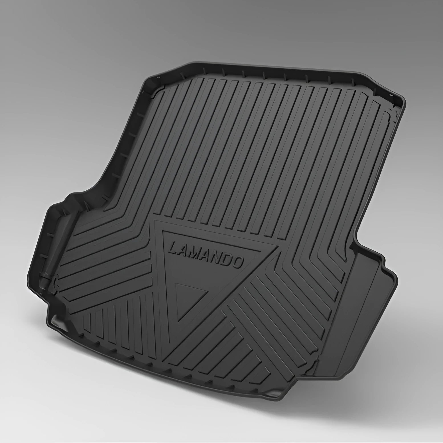 Black TPE car boot liner with carbon fibre pattern texture lying flat.