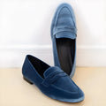 Blue and black sole suede-effect flat loafers with a round toe and rubber sole.