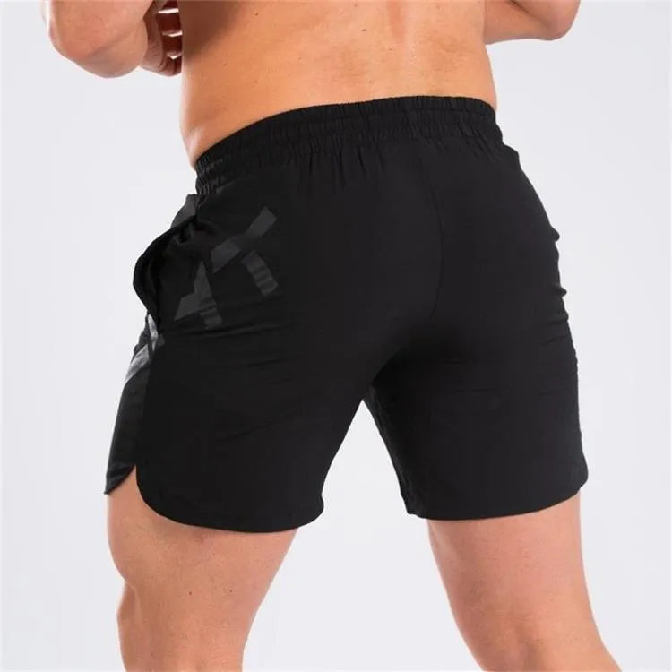 Men's black knee-length nylon training shorts with elastic waistband for summer sports