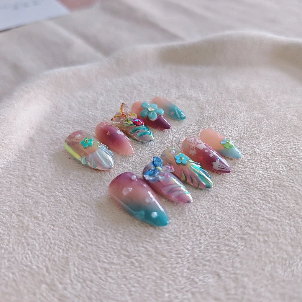 Handmade floral and butterfly nail art sculptures in four sizes for 3D manicure decorations